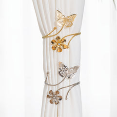 Two Golden/Silvery Butterfly And Flower-shaped Curtain Tiebacks, Featuring A Modern Minimalist Style With Creative Hollow Butterfly Design. These Adjustable Curtain Holders Can Be Installed Without Drilling, Suitable For Living Room, Bedroom, Office Home
